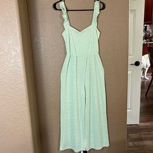 Size small, green romper